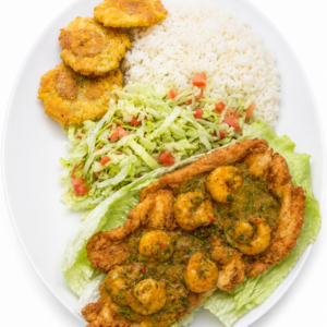 Chuleta a la Calima. Arroz blanco, patacones, ensalada, chuleta colombiana en salsa de camarones y sopa o consome